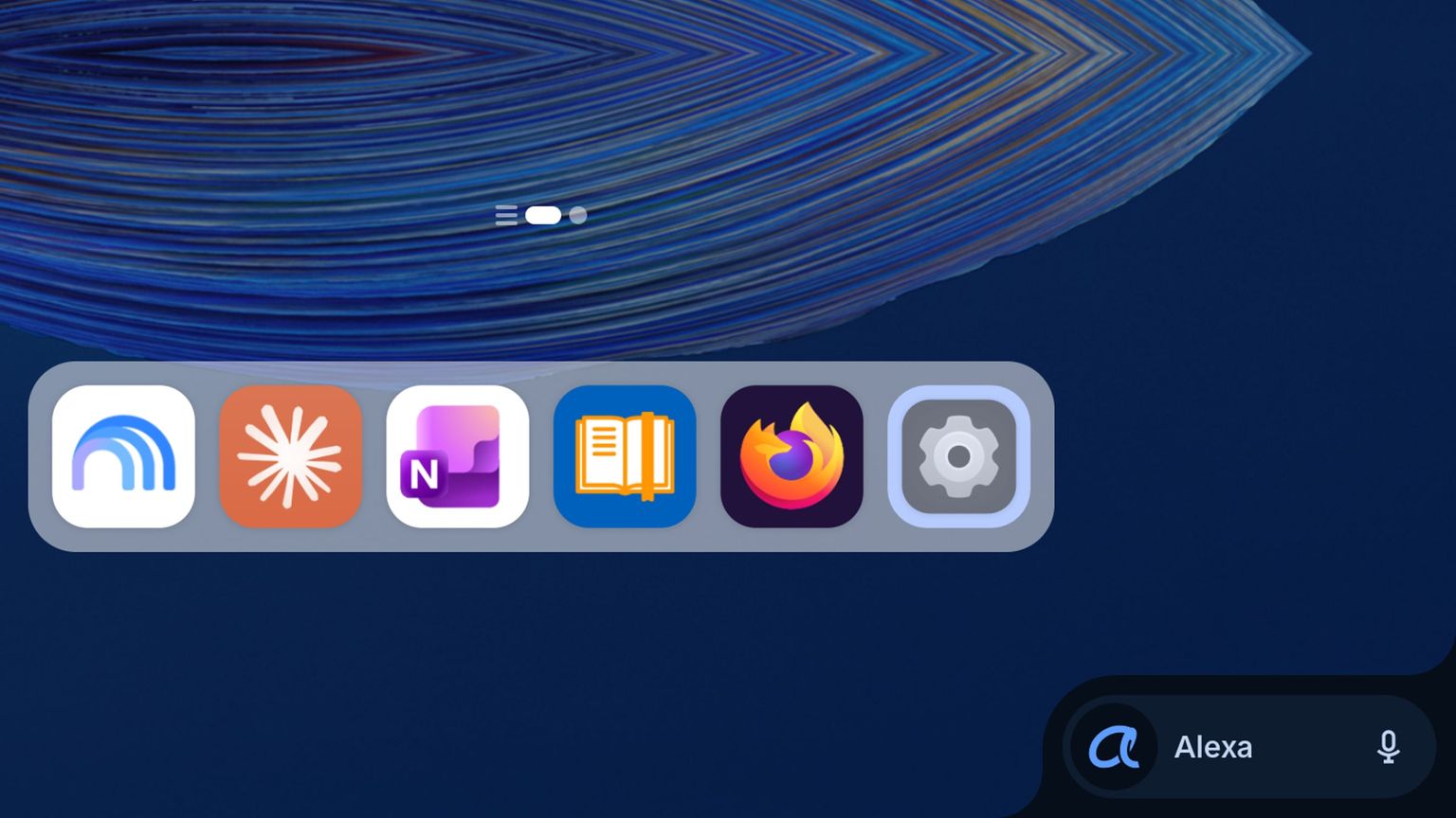 Unterer Rand des Startbildschirms des Alexa Tablet 12 Pro mit App-Dock und dem Alexa-Button mit Mikrofon unten rechts